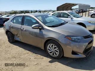 2018 Toyota Corolla L z VIN 2T1BURHE8JC097263, wystawiony jako Copart lot #57715595 z przebiegiem 78 598 mil mil oraz Szkoda całkowita • Salvage title. Historia ofert i sprzedaży dostępna na DreamBid. Obrazek 4.
