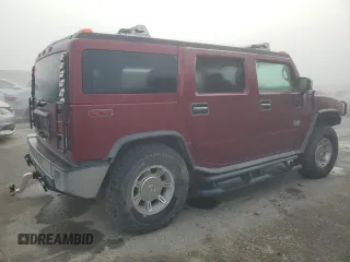 2003 Hummer H2 with VIN 5GRGN23UX3H147490, listed as a Copart auction lot 82876424 with 241,737 mi miles and Clean Title. Bid and sale history available at carsss.com. Image 3.