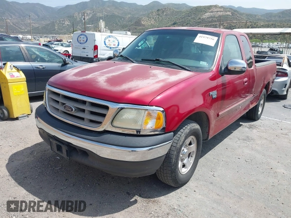 2002 Ford F-150 XL with VIN 1FTRX17LX2NB30978, listed as a IAAI auction lot 41979756 with 225,030 mi miles. Bid and sale history available at carsss.com. Image 2.