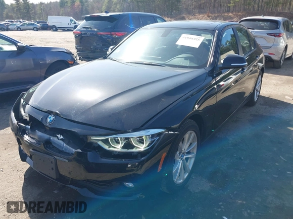 2018 BMW 3 Series 320i xDrive with VIN WBA8A3C53JA489544, listed as a IAAI auction lot 41948325 with 68,322 mi miles and . Bid and sale history available at DreamBid. Image 2.