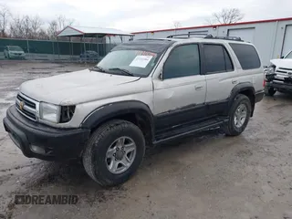 1999 Toyota 4Runner Limited with VIN JT3GN87R7X0105748, listed as a IAAI auction lot 41191084 with 325,053 mi miles and . Bid and sale history available at DreamBid. Image 2.