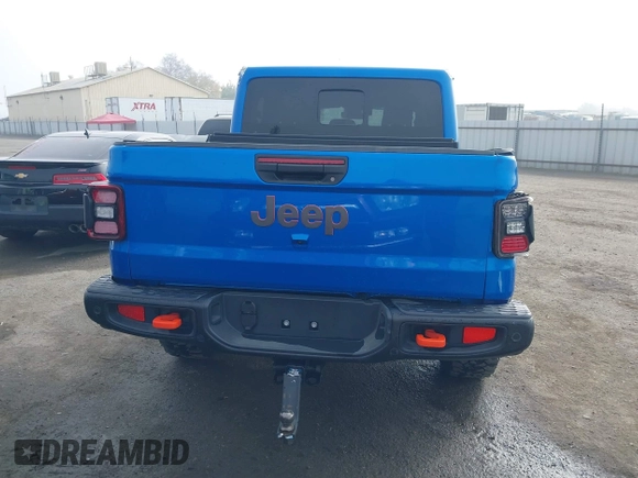 2024 Jeep Gladiator Mojave X z VIN 1C6JJTEG5RL121313, wystawiony jako IAAI lot #41013599 z przebiegiem 2 952 mil mil oraz . Historia ofert i sprzedaży dostępna na DreamBid. Obrazek 17.