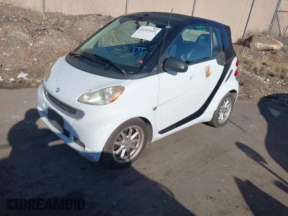 2009 Smart fortwo Passion with VIN WMEEK31X79K270472, listed as a IAAI auction lot 41365417 with 112,367 mi miles. Bid and sale history available at carsss.com. Image 2.