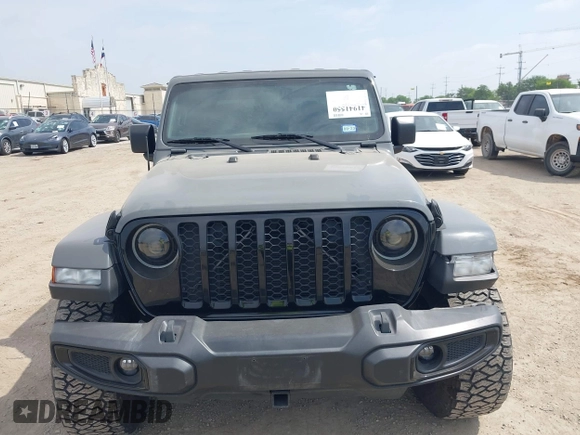 2021 Jeep Gladiator Sport S z VIN 1C6JJTAM1ML607525, wystawiony jako IAAI lot #41941550 z przebiegiem 59 283 mil mil oraz . Historia ofert i sprzedaży dostępna na DreamBid. Obrazek 12.