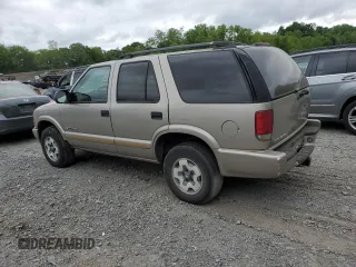 2004 Chevrolet Blazer LS z VIN 1GNDT13X84K162807, wystawiony jako Copart lot #57154205 z przebiegiem 82 732 mil mil oraz Czysty tytuł • Clean title. Historia ofert i sprzedaży dostępna na DreamBid. Obrazek 2.