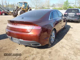2015 Lincoln MKZ with VIN 3LN6L2G97FR617532, listed as a IAAI auction lot 42070564 with 66,901 mi miles and . Bid and sale history available at DreamBid. Image 4.