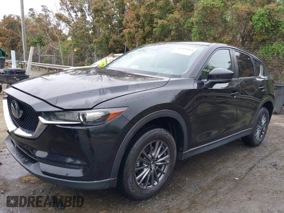 2020 Mazda CX-5 Touring with VIN JM3KFACM9L0770933, listed as a IAAI auction lot 41921464 with 75,997 mi miles. Bid and sale history available at carsss.com. Image 17.