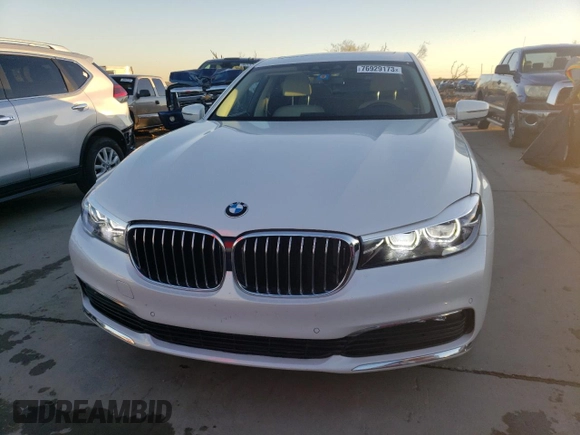2018 BMW 7 Series 740i with VIN WBA7E2C51JG741931, listed as a Copart auction lot 76929173 with 63,169 mi miles. Bid and sale history available at carsss.com. Image 5.