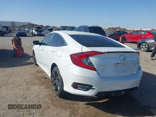 2020 Honda Civic Sedan Sport with VIN 19XFC2F8XLE016325, listed as a IAAI auction lot 41851007 with 68,310 mi miles. Bid and sale history available at carsss.com. Image 3.
