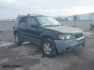 2004 Ford Escape XLT with VIN 1FMCU03114KB25567, listed as a IAAI auction lot 41559575 with 238,685 mi miles. Bid and sale history available at carsss.com. Image 1.