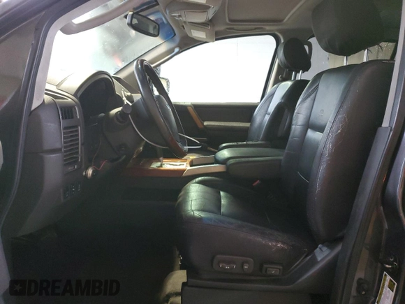2006 Infiniti QX56 z VIN 5N3AA08A96N800292, wystawiony jako Copart lot #42050855 z przebiegiem 305 926 mil mil oraz Czysty tytuł • Clean title. Historia ofert i sprzedaży dostępna na DreamBid. Obrazek 7.