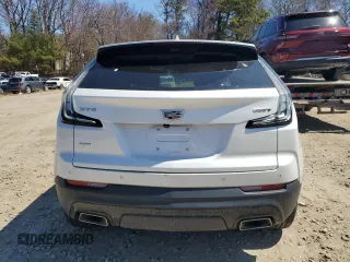 2021 Cadillac XT4 AWD Sport z VIN 1GYFZFR40MF006208, wystawiony jako Copart lot #53661335 z przebiegiem 24 785 mil mil oraz Szkody całkowita. Historia ofert i sprzedaży dostępna na DreamBid. Obrazek 6.