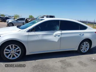 2014 Toyota Avalon Limited z VIN 4T1BK1EB5EU101243, wystawiony jako IAAI lot #42401159 z przebiegiem 91 916 mil mil oraz . Historia ofert i sprzedaży dostępna na DreamBid. Obrazek 15.