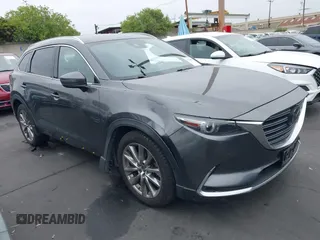 2018 Mazda CX-9 Grand Touring z VIN JM3TCBDY1J0200183, wystawiony jako IAAI lot #42408132 z przebiegiem 69 023 mil mil oraz . Historia ofert i sprzedaży dostępna na DreamBid. Obrazek 1.