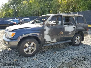 2003 Toyota Land Cruiser with VIN JTEHT05J332044364, listed as a Copart auction lot 70952174 with 0 mi miles and Salvage Title. Bid and sale history available at carsss.com. Image 1.
