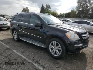 2012 Mercedes-Benz GL-Class GL 450 with VIN 4JGBF7BE9CA775884, listed as a Copart auction lot 81447043 with 163,514 mi miles and Salvage Title. Bid and sale history available at carsss.com. Image 4.