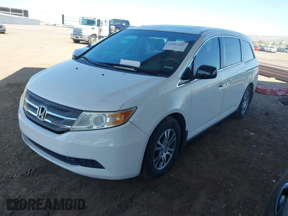 2012 Honda Odyssey EX-L with VIN 5FNRL5H67CB051764, listed as a IAAI auction lot 42493181 with 167,189 mi miles and . Bid and sale history available at DreamBid. Image 17.