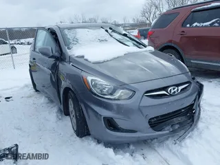 2014 Hyundai Accent GS with VIN KMHCT5AE1EU194495, listed as a IAAI auction lot 41609591 with 85,737 mi miles. Bid and sale history available at carsss.com. Image 1.