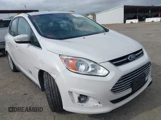 2016 Ford C-Max Energi SEL with VIN 1FADP5CUXGL102011, listed as a IAAI auction lot 41935337 with 95,279 mi miles. Bid and sale history available at carsss.com. Image 1.