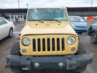 2014 Jeep Wrangler Rubicon with VIN 1C4BJWCG4EL145081, listed as a IAAI auction lot 42180723 with 113,659 mi miles and . Bid and sale history available at DreamBid. Image 12.