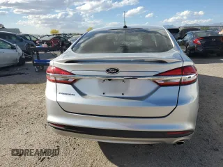 2018 Ford Fusion S z VIN 3FA6P0G77JR181212, wystawiony jako Copart lot #53244345 z przebiegiem 82 008 mil mil oraz Szkoda całkowita • Salvage title. Historia ofert i sprzedaży dostępna na DreamBid. Obrazek 6.