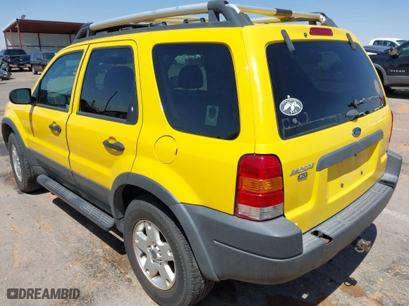 2003 Ford Escape XLT Popular 2 with VIN 1FMCU93143KC88233, listed as a IAAI auction lot 41929404 with 225,946 mi miles. Bid and sale history available at carsss.com. Image 3.