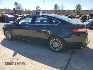 2016 Ford Fusion Titanium with VIN 3FA6P0K94GR269720, listed as a Copart auction lot 47759495 with 112,161 mi miles and Salvage Title. Bid and sale history available at DreamBid. Image 2.