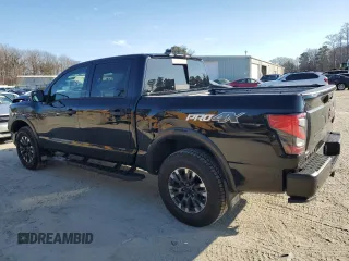 2024 Nissan Titan Pro-4X with VIN 1N6AA1ED6RN111104, listed as a Copart auction lot 46129425 with 4,903 mi miles and Salvage title. Bid and sale history available at DreamBid. Image 2.