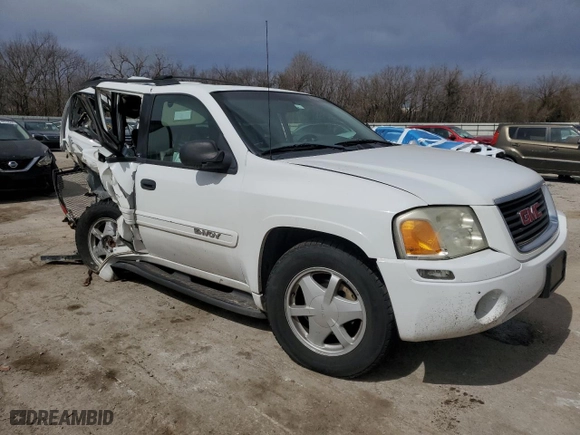 2003 GMC Envoy SLE with VIN 1GKDS13SX32259798, listed as a Copart auction lot 48712015 with 100,330 mi miles and Salvage Title. Bid and sale history available at carsss.com. Image 4.