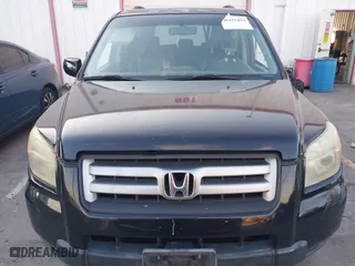 2006 Honda Pilot EX-L with RES with VIN 5FNYF28616B029670, listed as a IAAI auction lot 41425494 with 206,756 mi miles. Bid and sale history available at carsss.com. Image 12.