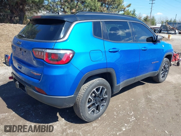 2019 Jeep Compass Trailhawk with VIN 3C4NJDDB5KT683907, listed as a IAAI auction lot 41876584 with 54,685 mi miles and . Bid and sale history available at DreamBid. Image 4.