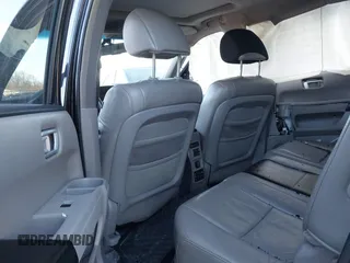 2009 Honda Pilot EX-L with VIN 5FNYF48649B026889, listed as a IAAI auction lot 41643289 with 121,511 mi miles and . Bid and sale history available at carsss.com. Image 8.