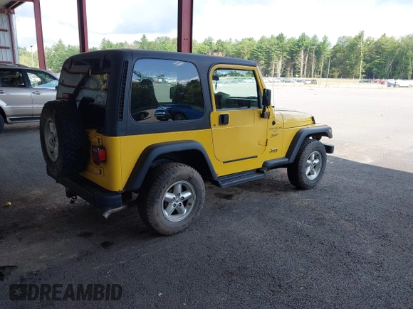2001 Jeep Wrangler Sport with VIN 1J4FA49S81P370778, listed as a IAAI auction lot 42715015 with 123,259 mi miles and . Bid and sale history available at DreamBid. Image 4.