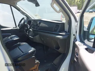 2021 Ford Transit Cargo z VIN 1FTBW3X88MKA42155, wystawiony jako IAAI lot #41988889 z przebiegiem 74 643 mil mil oraz . Historia ofert i sprzedaży dostępna na DreamBid. Obrazek 5.