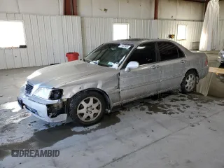 2002 Acura RL with VIN JH4KA96692C001363, listed as a Copart auction lot 41933965 with 170,358 mi miles and Salvage title. Bid and sale history available at DreamBid. Image 1.
