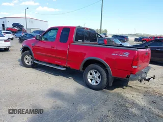 2003 Ford F-150 XL with VIN 2FTRX18L13CA49907, listed as a IAAI auction lot 41888674 with 132,944 mi miles. Bid and sale history available at carsss.com. Image 3.
