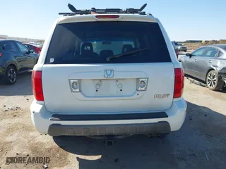 2005 Honda Pilot EX-L with NAVI with VIN 2HKYF18775H571312, listed as a IAAI auction lot 41830609 with 297,923 mi miles. Bid and sale history available at carsss.com. Image 16.