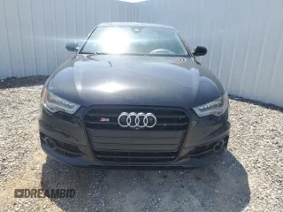 2014 Audi S6 Prestige z VIN WAUF2AFC9EN133262, wystawiony jako Copart lot #48524255 z przebiegiem 120 103 mil mil oraz Tytuł czysty. Historia ofert i sprzedaży dostępna na DreamBid. Obrazek 5.