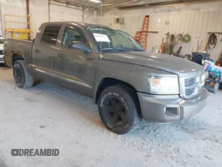 2008 Dodge Dakota Laramie with VIN 1D7HW58N58S602395, listed as a IAAI auction lot 42062915 with 166,161 mi miles. Bid and sale history available at carsss.com. Image 1.