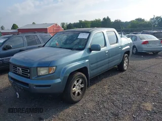 2006 Honda Ridgeline RTL with VIN 2HJYK16526H531884, listed as a IAAI auction lot 42796524 with 334,489 mi miles and . Bid and sale history available at DreamBid. Image 2.