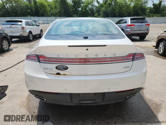 2015 Lincoln MKZ Hybrid z VIN 3LN6L2LU7FR609215, wystawiony jako Copart lot #63211665 z przebiegiem 149 636 mil mil oraz Nie do naprawy • Non repairable. Historia ofert i sprzedaży dostępna na DreamBid. Obrazek 6.