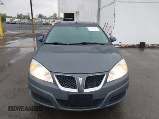 2009 Pontiac G6 1SB z VIN 1G2ZJ57B494247783, wystawiony jako IAAI lot #42309071 z przebiegiem 124 865 mil mil oraz . Historia ofert i sprzedaży dostępna na DreamBid. Obrazek 12.