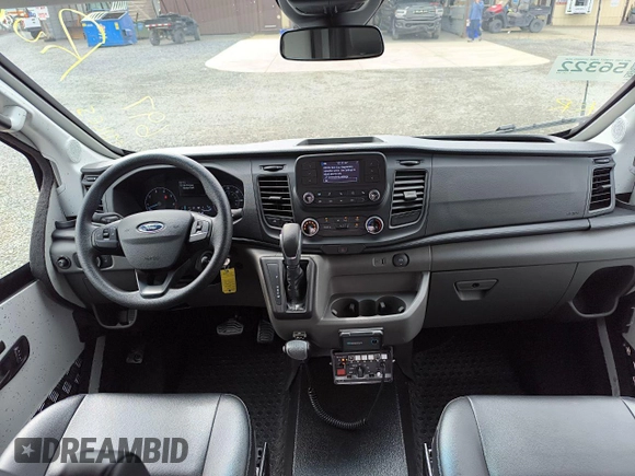 2023 Ford Transit Cargo with VIN 1FTRU8XG8PKC05304, listed as a Copart auction lot 60695455 with 697 mi miles and Clean title. Bid and sale history available at DreamBid. Image 6.