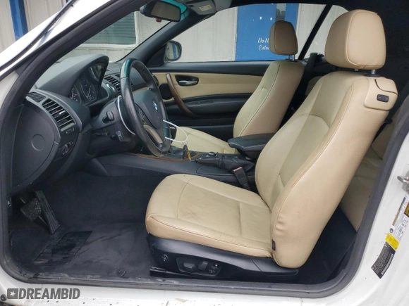 2011 BMW 1 Series 128i with VIN WBAUN1C5XBVH82605, listed as a Copart auction lot 73457334 with 94,969 mi miles and Salvage Title. Bid and sale history available at carsss.com. Image 7.