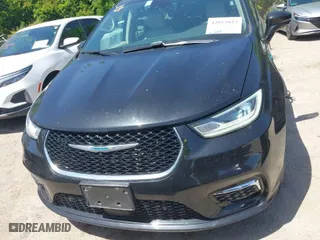 2021 Chrysler Pacifica Hybrid Touring L with VIN 2C4RC1L73MR599629, listed as a IAAI auction lot 42013823 with 62,886 mi miles. Bid and sale history available at carsss.com. Image 12.