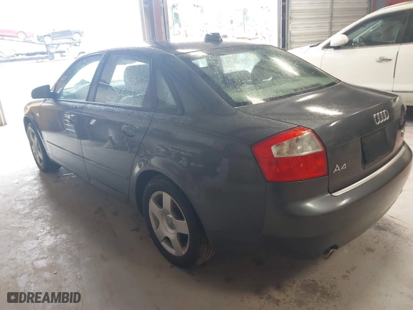 2004 Audi A4 1.8T with VIN WAULC68E04A055889, listed as a IAAI auction lot 41986309 with 124,598 mi miles. Bid and sale history available at carsss.com. Image 3.