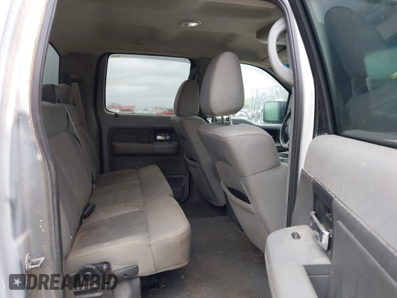 2007 Ford F-150 XLT z VIN 1FTRW14W27KD53977, wystawiony jako IAAI lot #41935006 z przebiegiem 163 444 mil mil oraz . Historia ofert i sprzedaży dostępna na DreamBid. Obrazek 8.