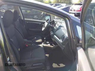 2015 Honda Fit EX with VIN 3HGGK5G86FM755209, listed as a IAAI auction lot 42450499 with 29,735 mi miles and . Bid and sale history available at DreamBid. Image 5.