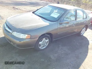 2000 Nissan Altima XE with VIN 1N4DL01D8YC235627, listed as a IAAI auction lot 41662564 with 79,409 mi miles. Bid and sale history available at carsss.com. Image 2.