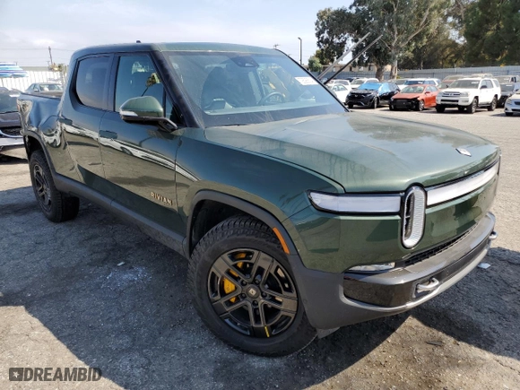 2023 Rivian R1T Adventure with VIN 7FCTGAAA9PN018171, listed as a Copart auction lot 72593614 with 12,553 mi miles and Salvage Title. Bid and sale history available at carsss.com. Image 4.